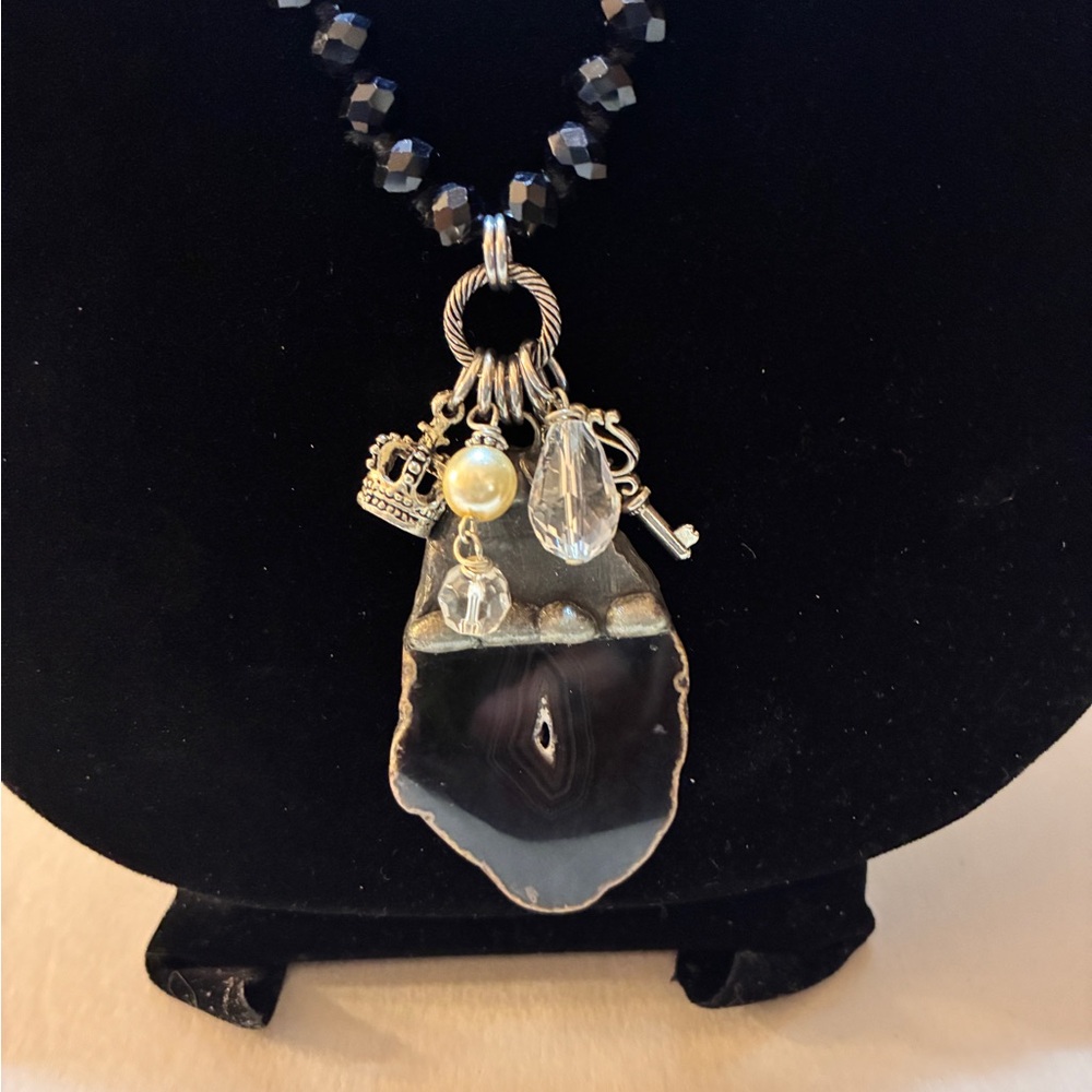 Beautiful Obsidian Slab Pendant with Charms on a Single Strand of Faceted Beads